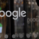 A visitor enters the the offices of Google in London.